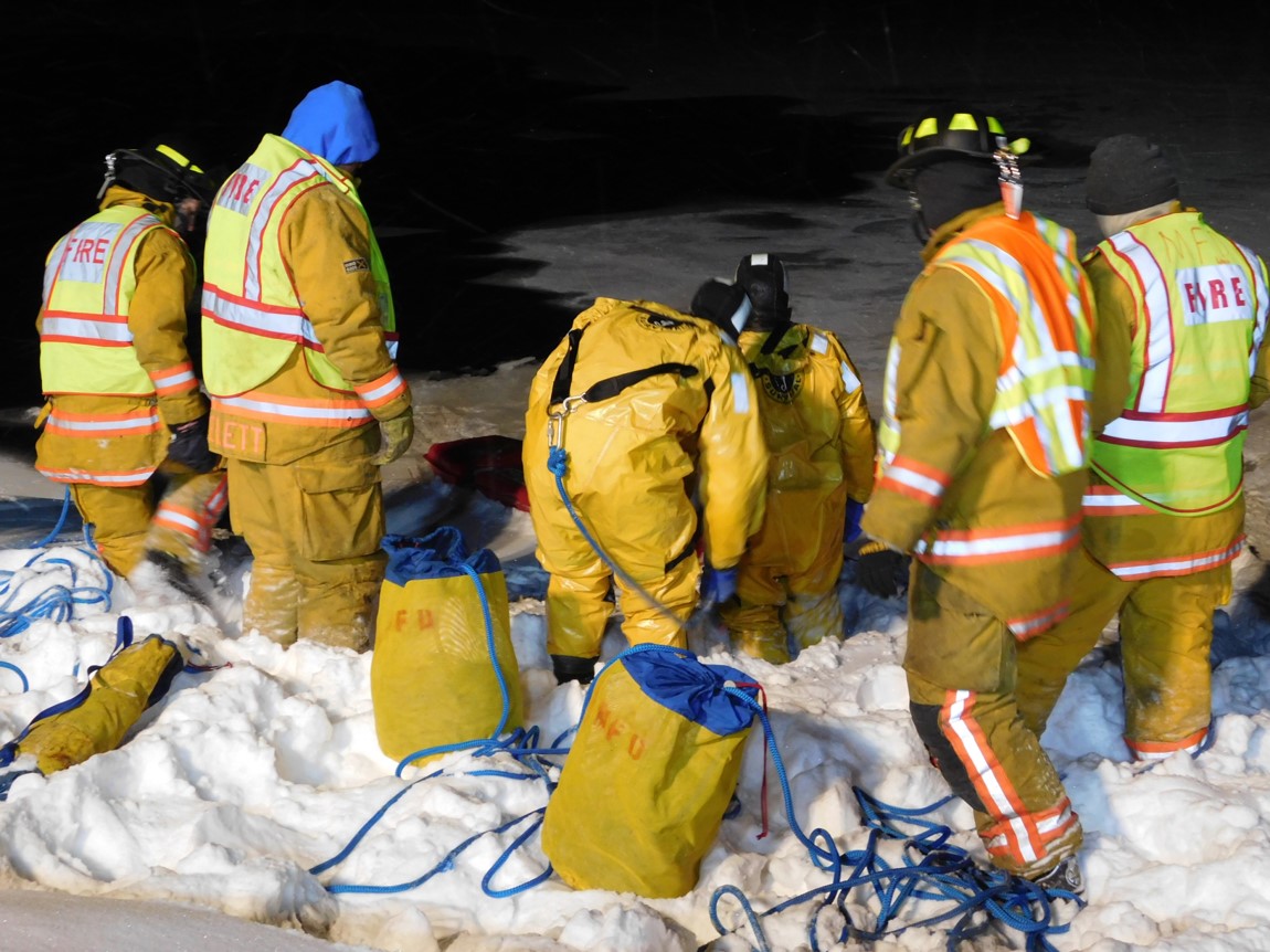 Fire fighters out in the snow investigating