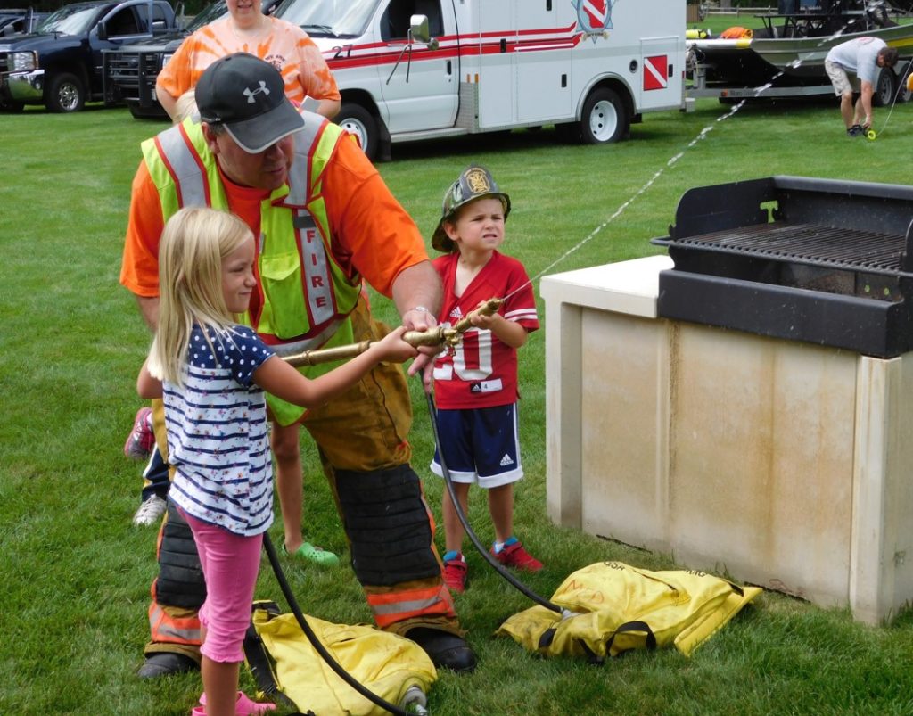 kids learning about fire fighting