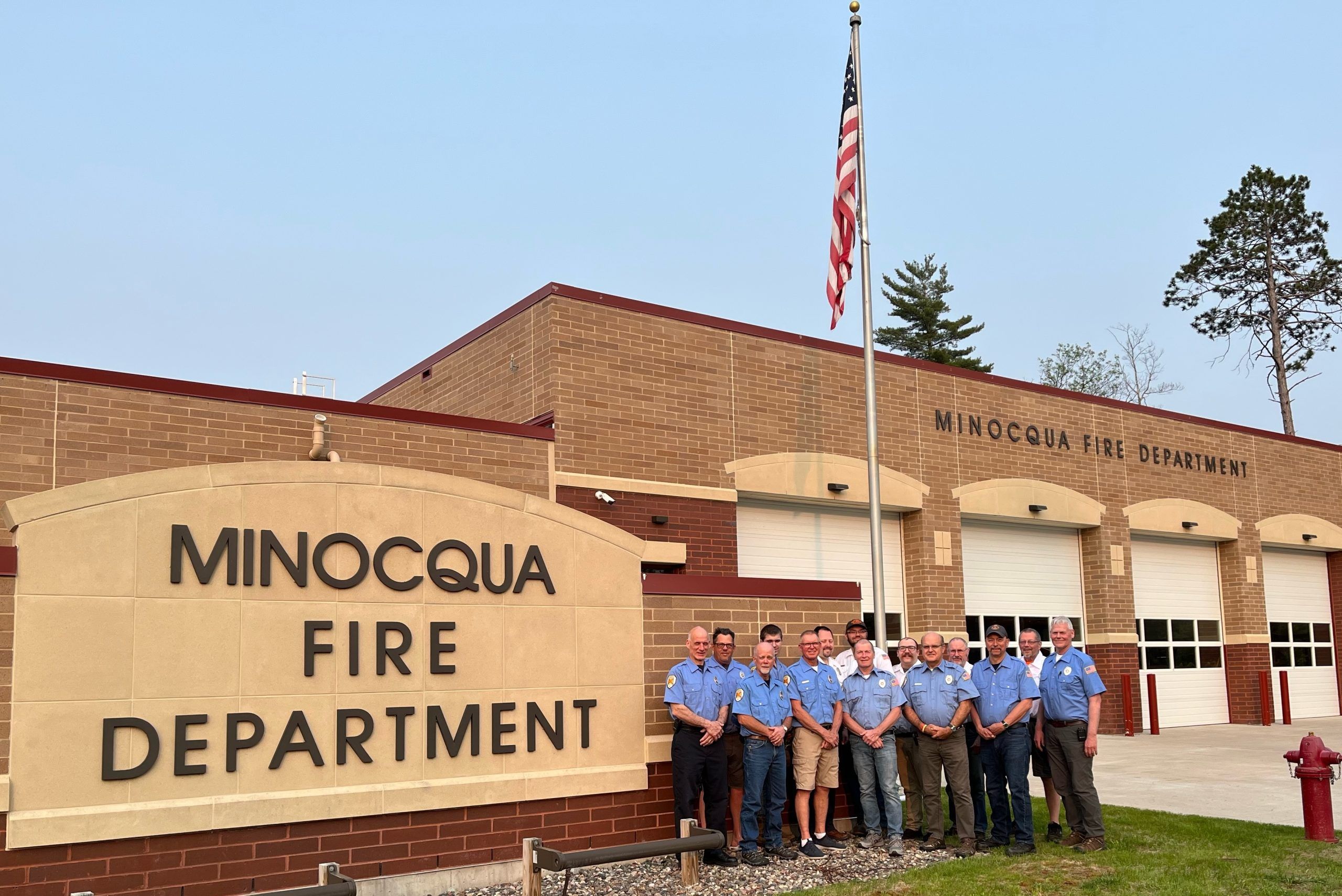 The Minocqua fire department staff in front the station